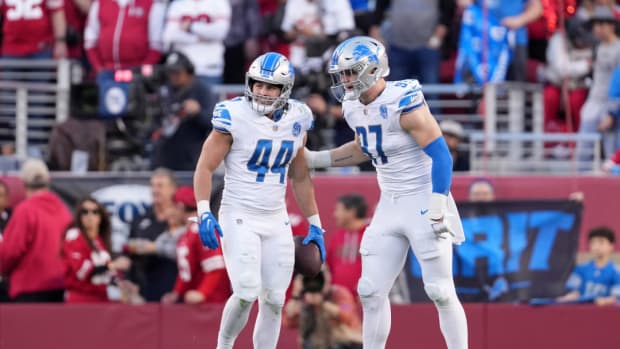 Detroit Lions defensive end Aidan Hutchinson and linebacker Malcolm Rodriguez.
